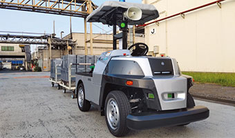 Transporting in an automated guided EV vehicle